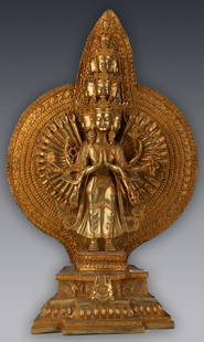 Tibetan Gilt Bronze Temple Figure: Thousand-Arm Multi-Head Deity: "Magnificent Tibetan Gilt Bronze Temple Figure: Thousand-Arm Multi-Head Deity" Introduction:
Prepare to be mesmerized by the grandeur of this exquisite Tibetan gilt bronze temple figure,