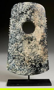 Ancient Ceremonial Artifact: Axe-Shaped Relic from 2000 BC: "Ancient Ceremonial Artifact: Axe-Shaped Relic from 2000 BC" Introduction:
Step into the ancient world with this captivating ceremonial artifact, an axe-shaped relic dating back to