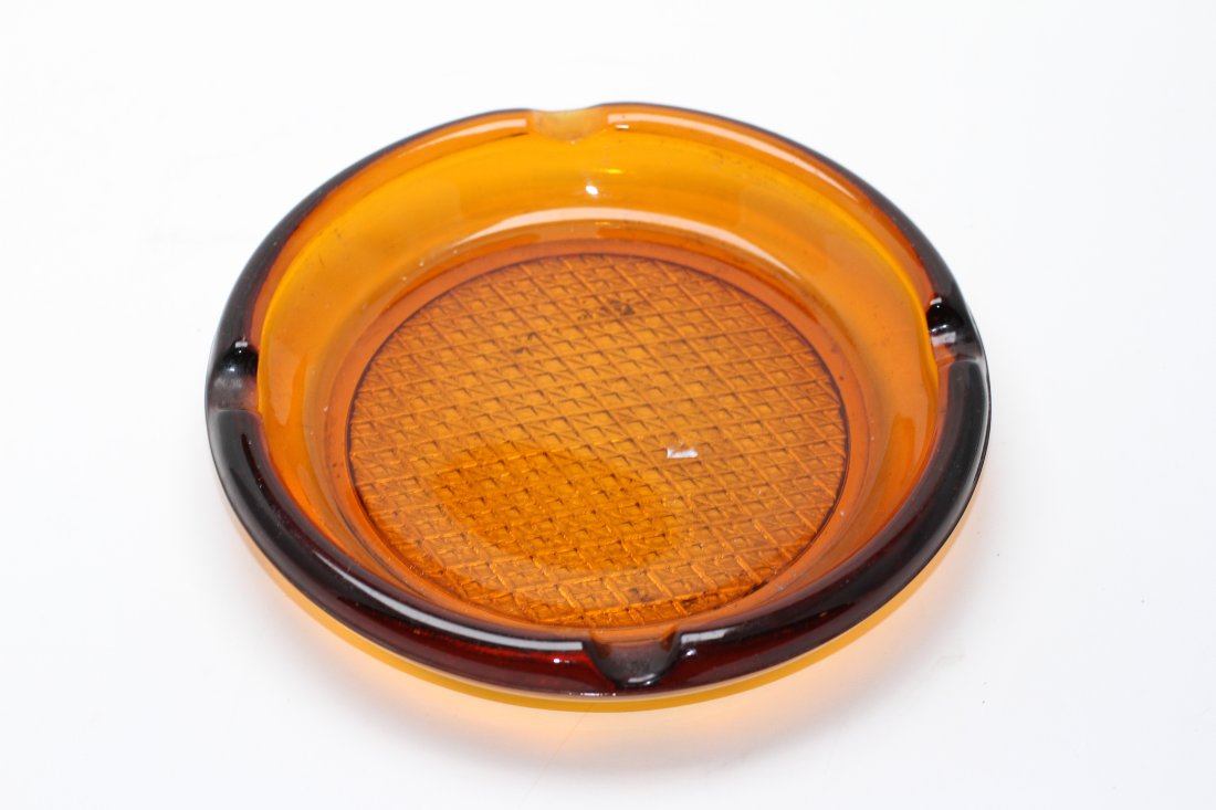 VINTAGE EIGHT INCH AMBER COLORED ASH TRAY: Vintage Eight Inch Amber Colored Ash Tray.
