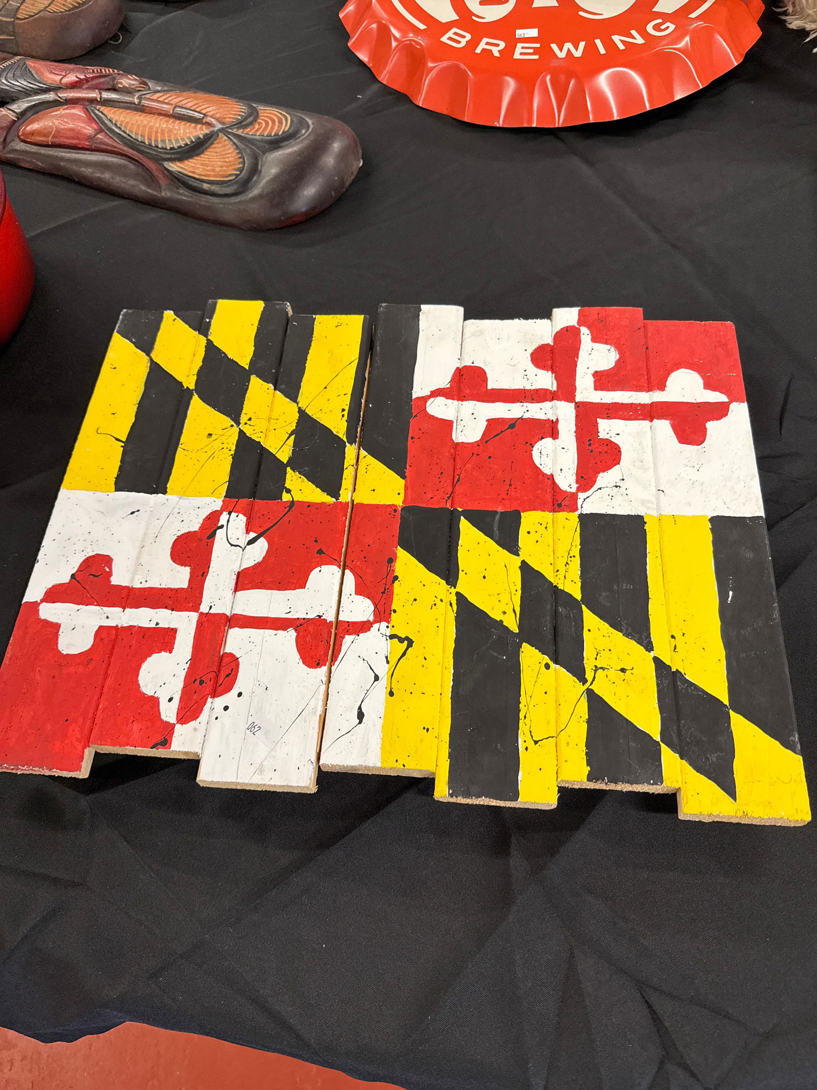 PAINTED WOOD MARYLAND FLAG: Painted Wood Maryland Flag. Approximately 17x14 inches.