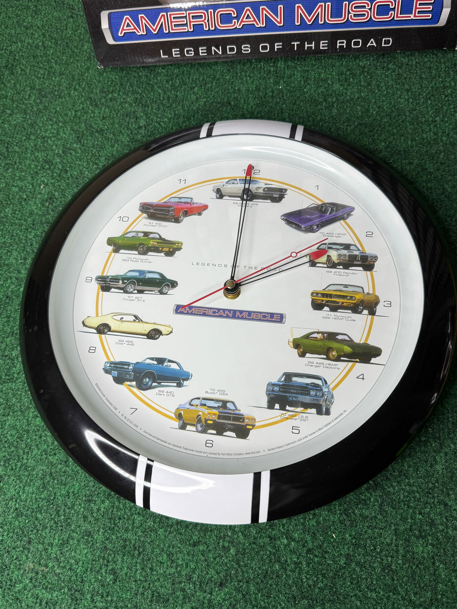 AMERICAN MUSCLE WALL CLOCK: American Muscle Wall Clock. Legends of the road. Item appears to be working!