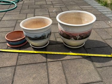3 Southwest themed outdoor pots of various sizes
