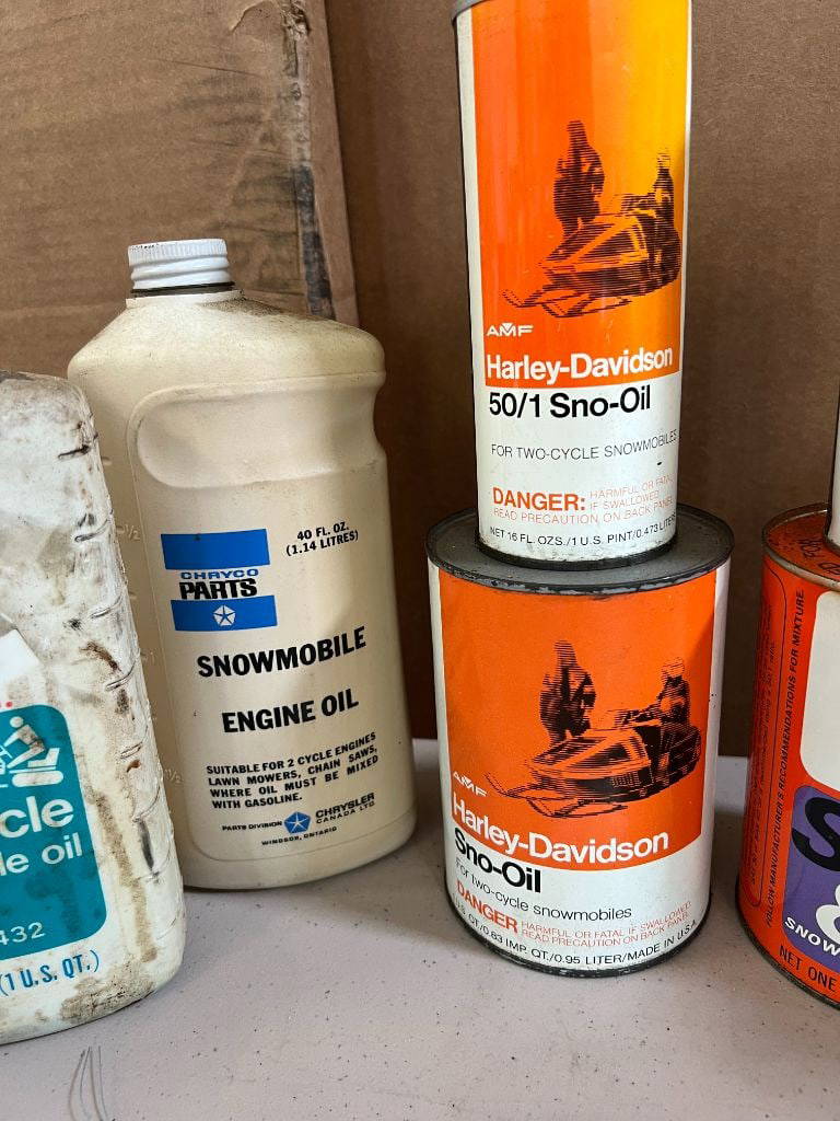 278 (10) Vintage Snowmobile Cans Auction
