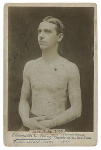 Cabinet Card of Tattooed Man Jake Kuhn (New York, ca. 1902): Cabinet Card of Tattooed Man Jake Kuhn (New York, ca. 1902) Kuhn was reportedly the first man tattooed by legendary Bowery tattooer Charlie Wagner. The 1896/1897 inscription on this card, added by