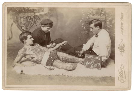 Cabinet Card of Charlie Wagner and Lew Alberts Tattooing Jack Tryon (New York, ca. 1905): Cabinet Card of Charlie Wagner and Lew Alberts Tattooing Jack Tryon (New York, ca. 1905) Depicting legendary Bowery tattoo artists Charlie Wagner (1875-1953) and Lew Alberts (1880-1954) tattooing