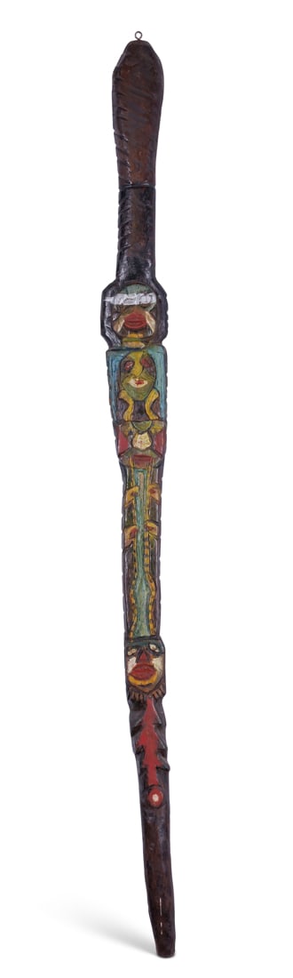 Folk Art Walking Stick by Tattoo Artist Gus Wagner (Kansas, ca. 1925) 34 x 2 1/2 in. (86.4 x 6.4: Folk Art Walking Stick by Tattoo Artist Gus Wagner (Kansas, ca. 1925) Hand-carved and painted cane by Gus Wagner (1872-1941), probably Clements, Kansas, ca. 1925. Featuring faces carved on one side wi