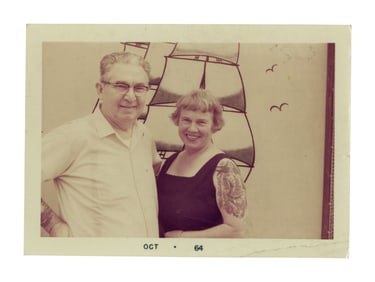 Snapshot Photo of Tattoo Artist Bert Grimm (California, 1964) 2 1/2 x 3 1/2 in. (6.4 x 8.9 cm.)