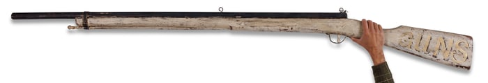 Large Carved Rifle-Form Trade Sign for a Gun Shop 83 in. (x 210.8 cm.)