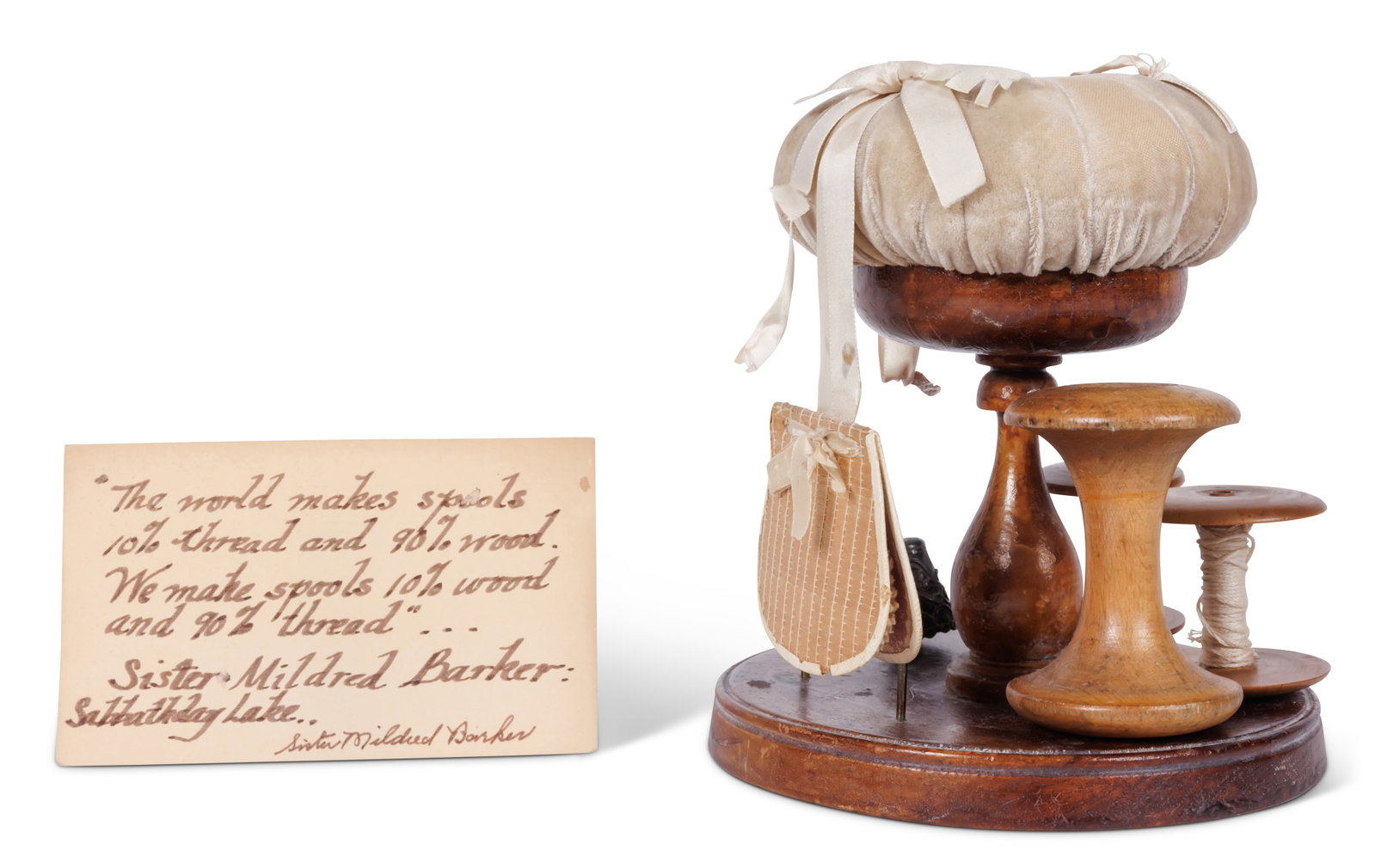 Shaker Spool Pincushion, Sister Mildred Barker (Sabbathday Lake, Maine, ca. 1900) 6 1/2 x 6 in.: Shaker Spool Pincushion, Sister Mildred Barker (Sabbathday Lake, Maine, ca. 1900) Featuring a velvet pincushion with silk ribbons; woven poplar needle case; lathe-turned spools, and a velvet strawberr