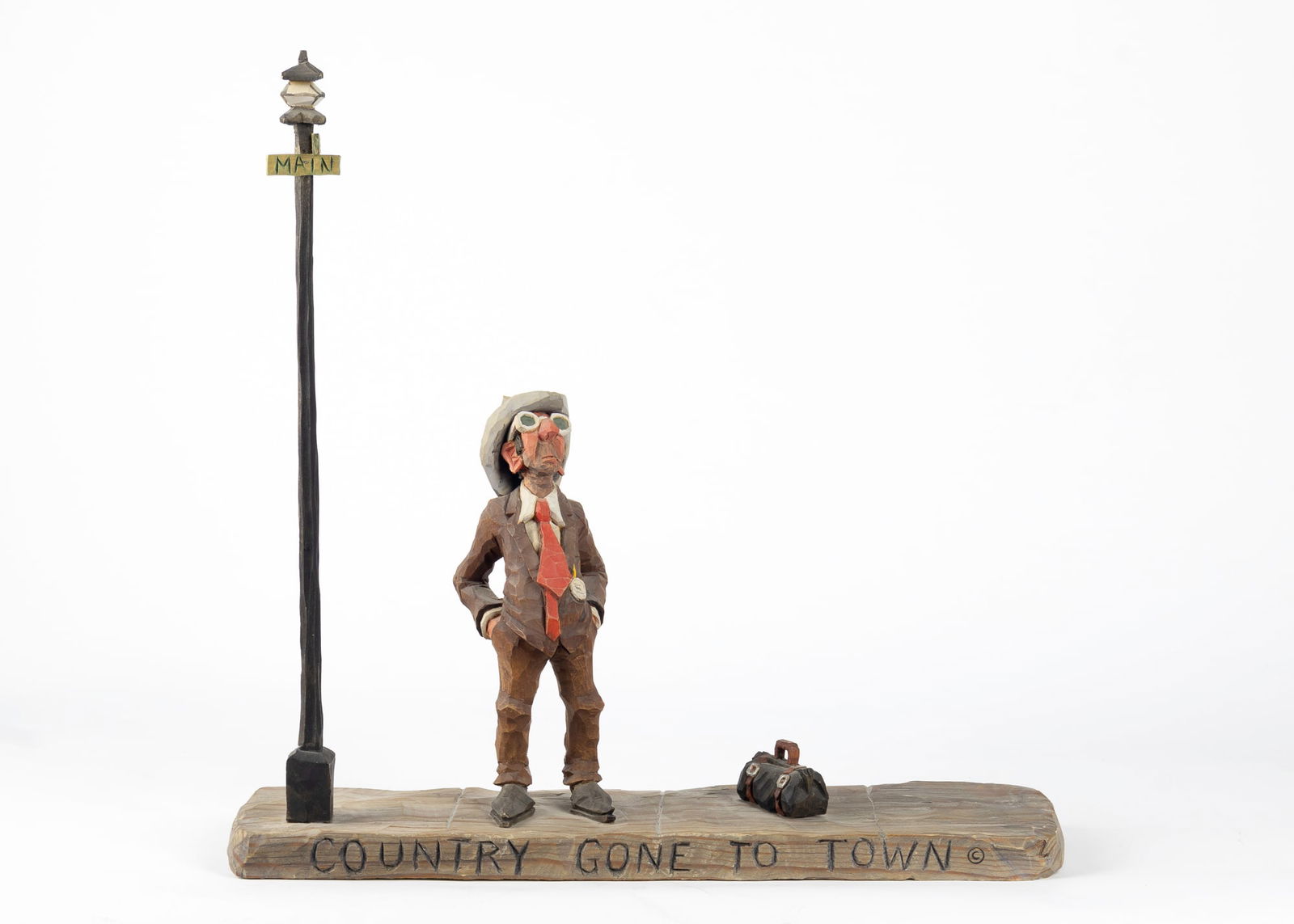 Gene Zesch (1932- ), Country Gone To Town: Gene Zesch (1932- ) Country Gone To Town Medium: wood Dimensions: 15 1/2 x 15 x 4 1/4 Signature inscribed: Country Gone To Town © Z Provenance From a Private Collection