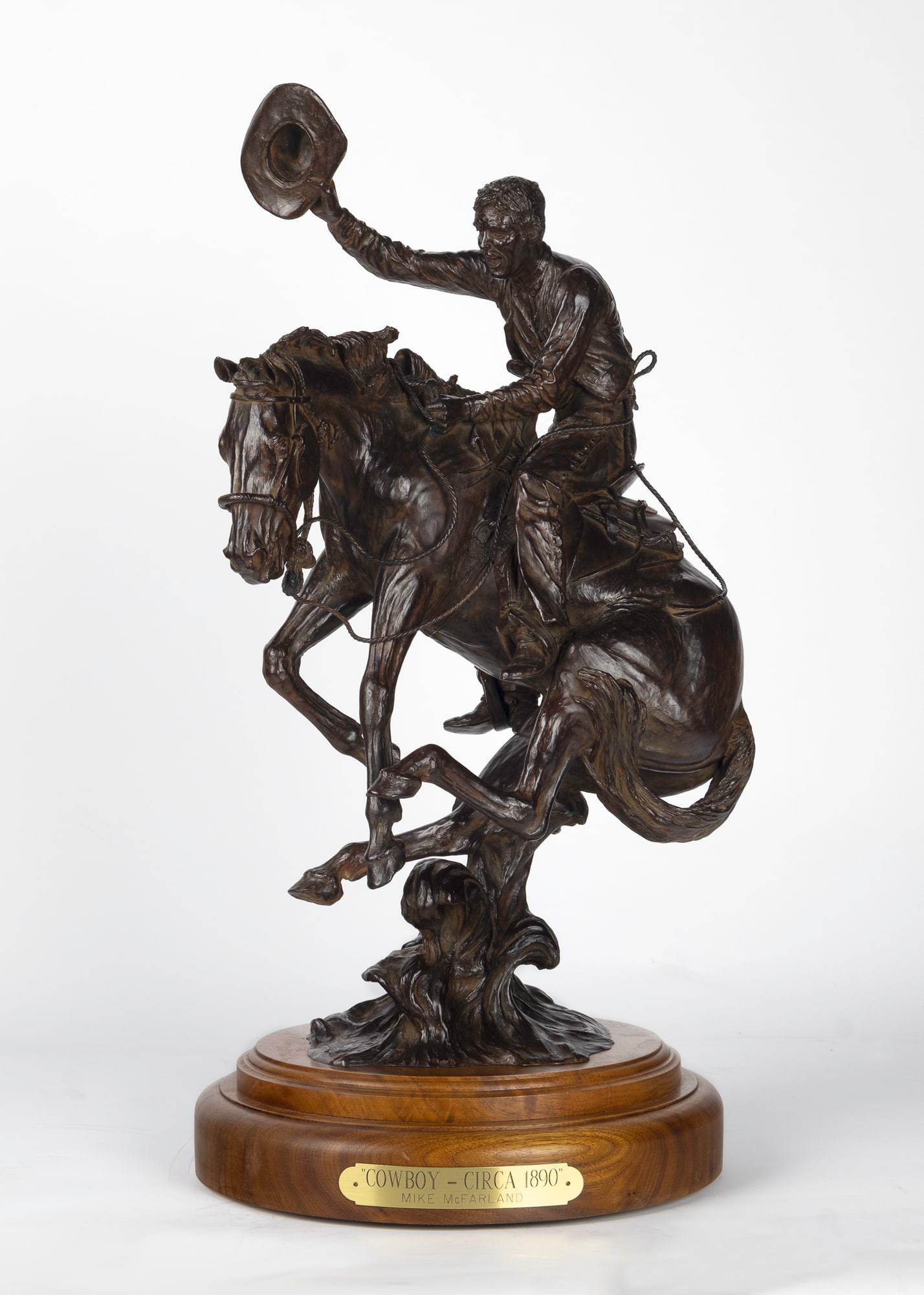 Mike McFarland (1947- ), Cowboy - Circa 1890, 1986: Mike McFarland (1947- ) Cowboy - Circa 1890 Medium: bronze, 5/16 Dimensions: 18 1/2 x 10 x 6 1/2 Framed Dimensions: 21 x 10 x 8 7/8 Signature inscribed: Mike McFarland © 1986 5/16 Provenance Buffalo 