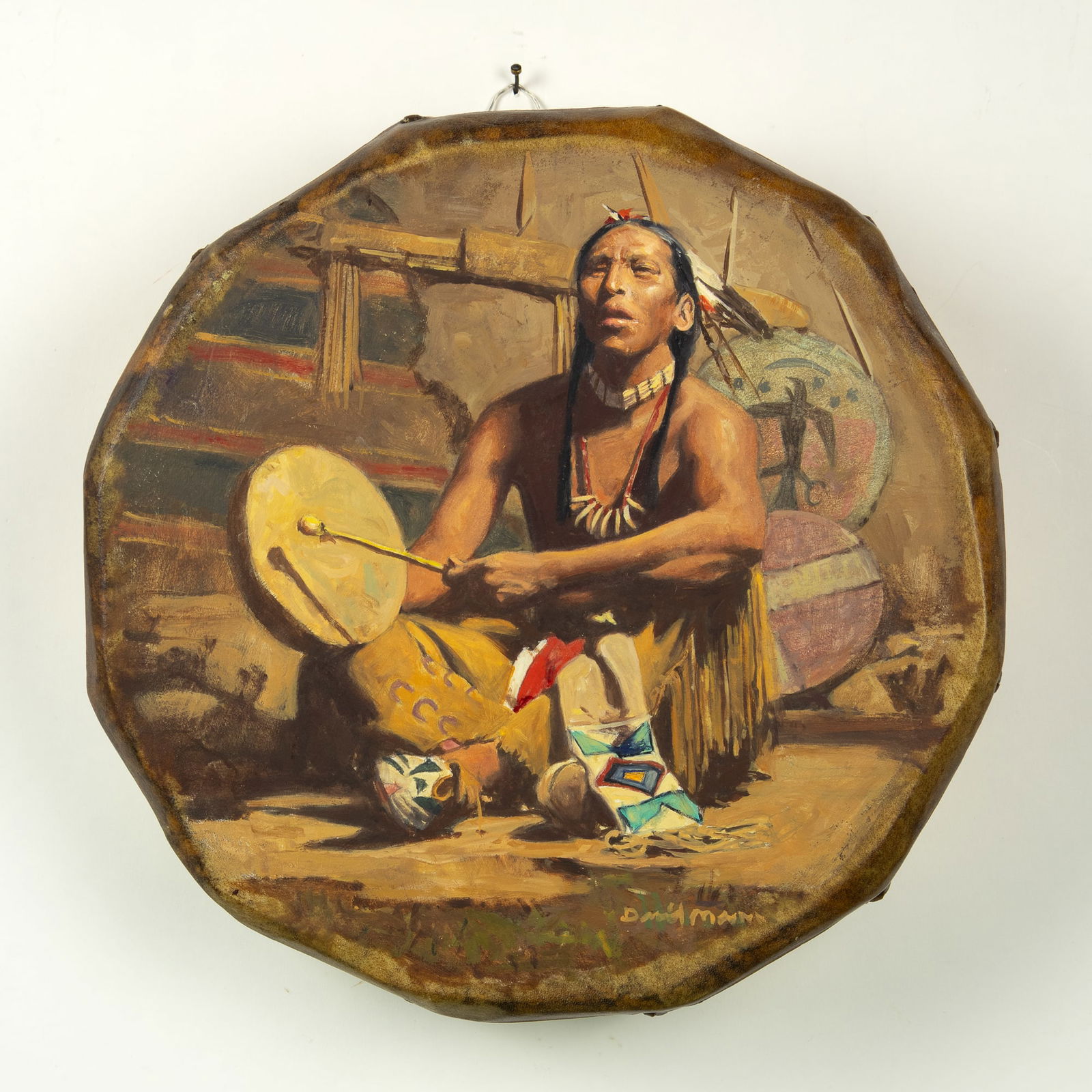 David Mann (1948- ): Drum Beat: David Mann (1948- ): Drum Beat Medium: oil on rawhide on wood Dimensions: 12 1/2 x 12 1/4 x 1 5/8 Signature: signed lower right: David Mann Provenance: Altermann Galleries & Auctioneers, November 2019
