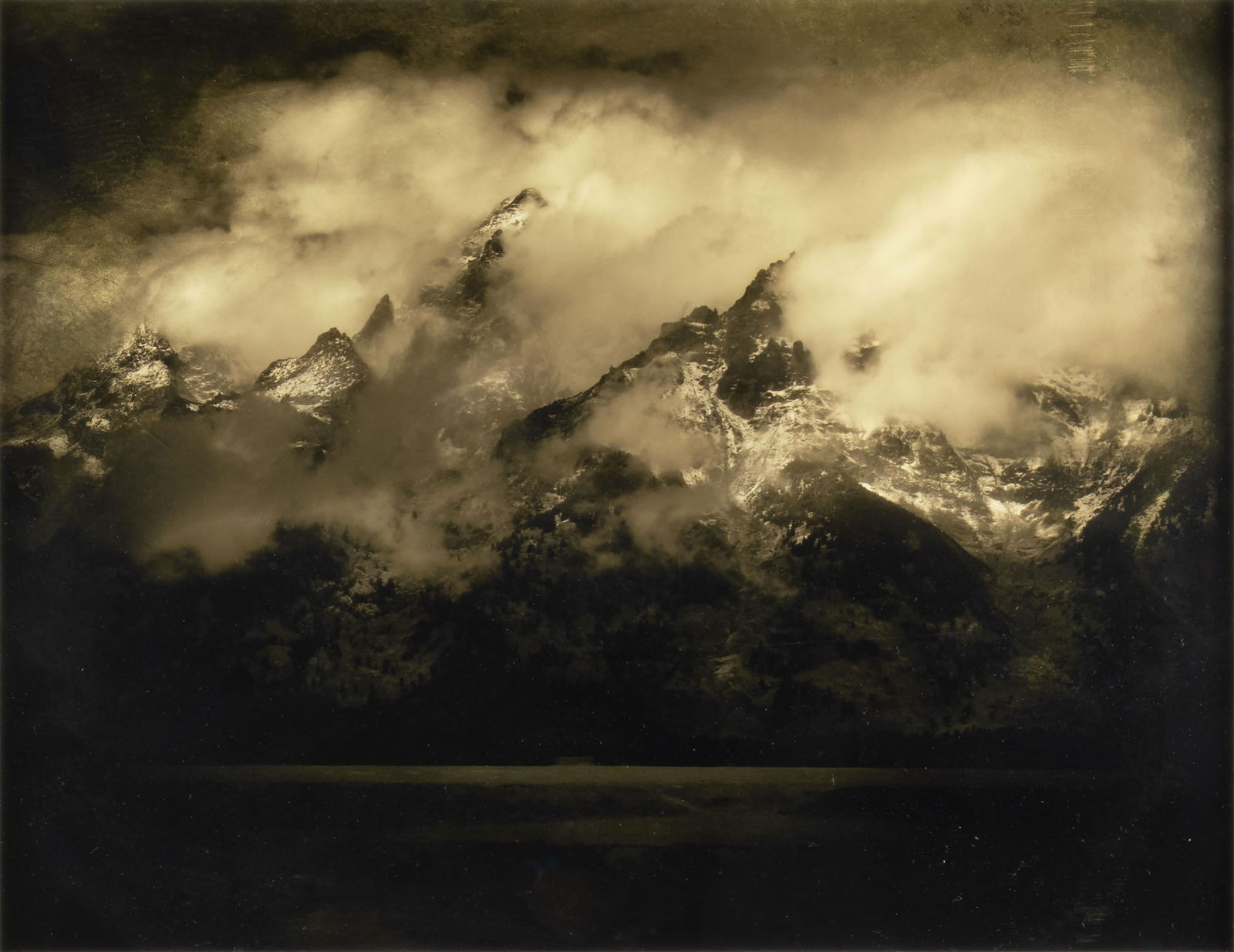 Jack Spencer, b.1951, Tetons in Clouds: Jack Spencerb.1951Tetons in Cloudsarchival pigment print with mixed media glaze, 2/20verso: titled, dated and signed19 1/2 x 25 1/2 in., Frame: 33 3/8 x 38 1/2 in. Provenance:Randolph Laub