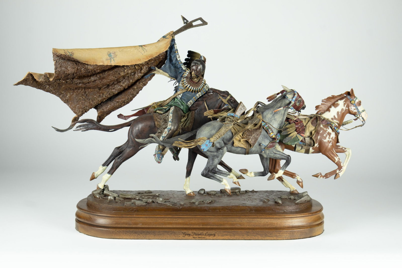 Dave McGary, Gray Hawk's Legacy, 2001: Dave McGary 1958-2013 Gray Hawk's Legacy, 2001 bronze, edition 1 of 60 inscribed: DAVE McGARY 2001 1/60 (thumbprint) From the Warrior Series Maquette edition 19 1/2 x 36 x 6 in., With Ba