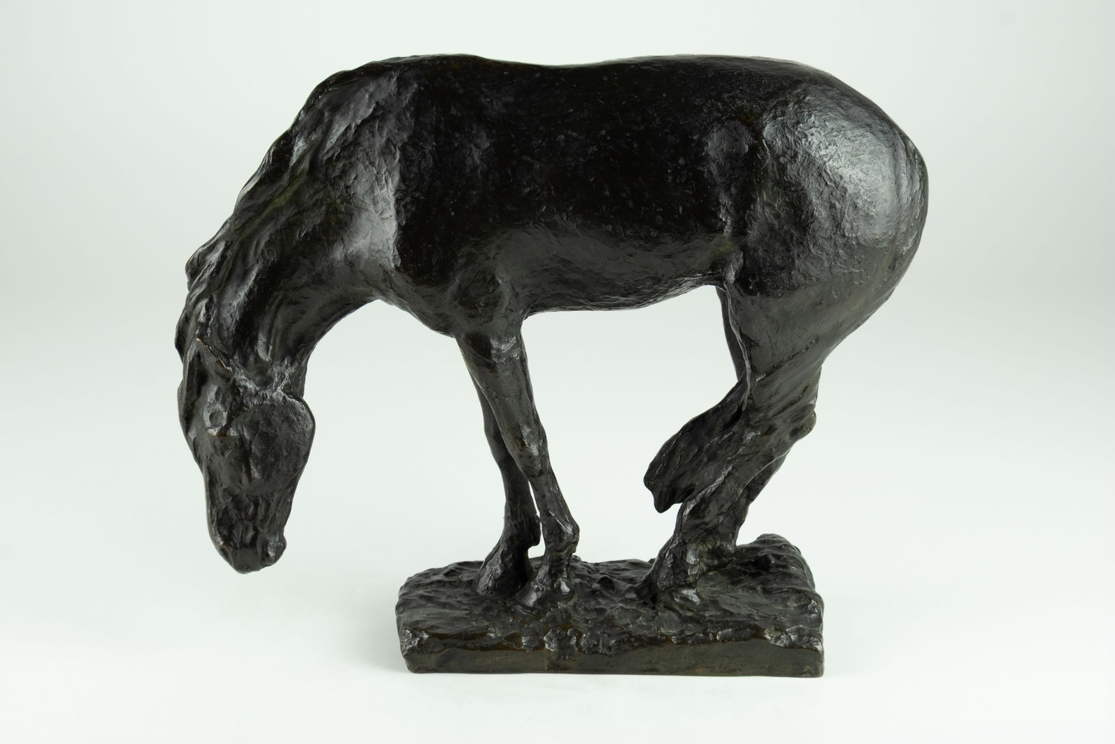 Solon Hannibal Borglum, Horse, 1905: Solon Hannibal Borglum 1868-1922 Horse Grazing, 1905 bronze inscribed: S.H.BORGLUM. inscribed: Roman Bronze Works N.Y. 1905. modeled in 1905 11 7/8 x 13 5/8 x 4 1/2 in. Provenance: From a Private