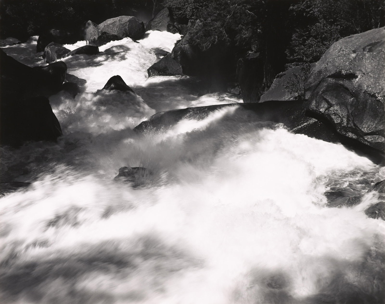 Ansel Adams, Rapids Below Vernal Fall, Yosemite, CA, 1948: Ansel Adams 1902-1984 Rapids Below Vernal Fall, Yosemite, CA, 1948 gelatin silver print on paper signed lower right: Ansel Adams stamped verso: Anne Adams Helms collection stamp 7 1/2 x 9 5/8 in., Mou