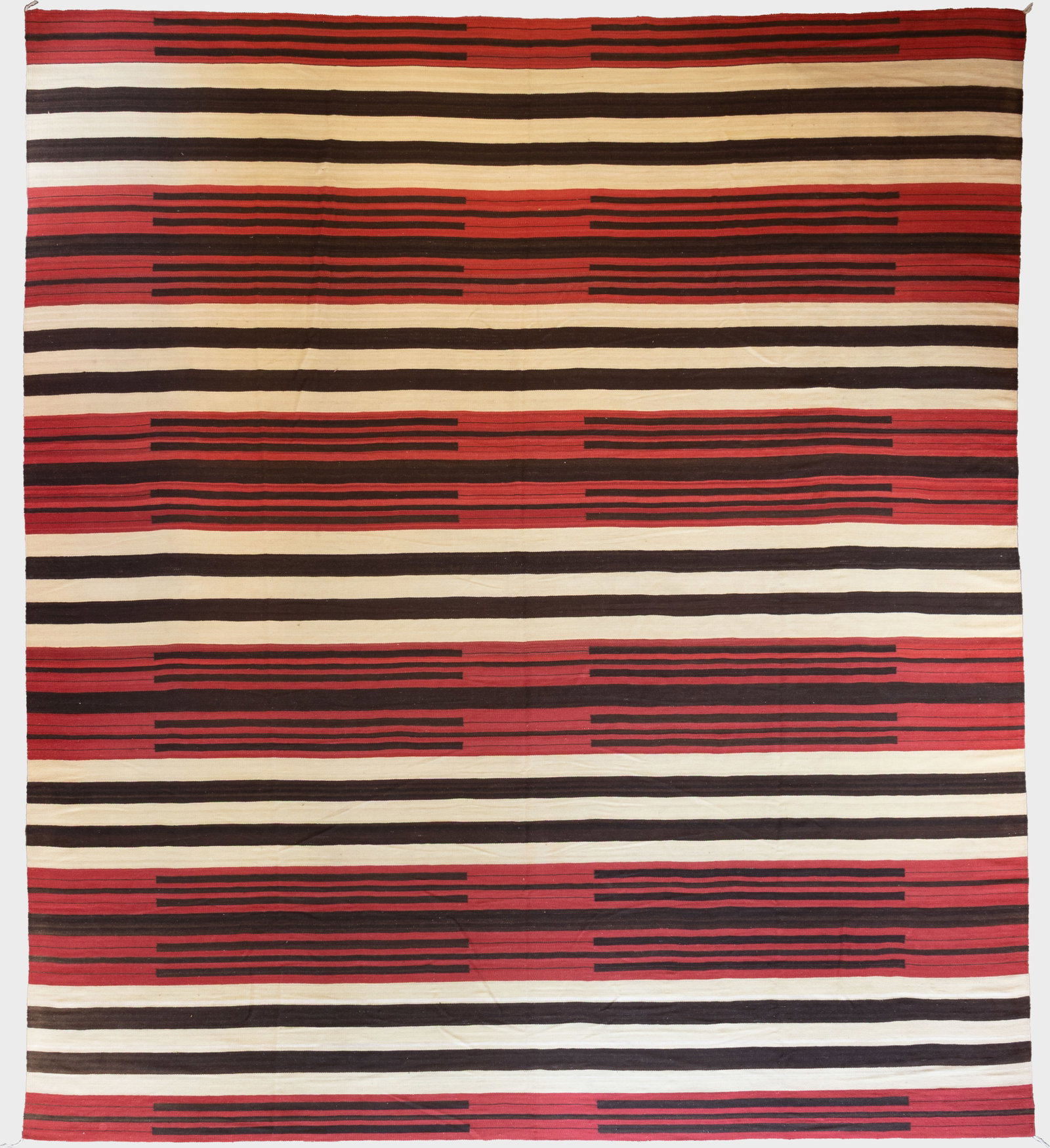 Zapotec, Contemporary Rug in Traditional Navajo Chief's Blanket Pattern, c. 1990: Zapotec Contemporary Rug in Traditional Navajo Chief's Blanket Pattern, c. 1990 wool with natural and aniline dyes 153 1/2 x 176 in. Provenance: From a Private Collection