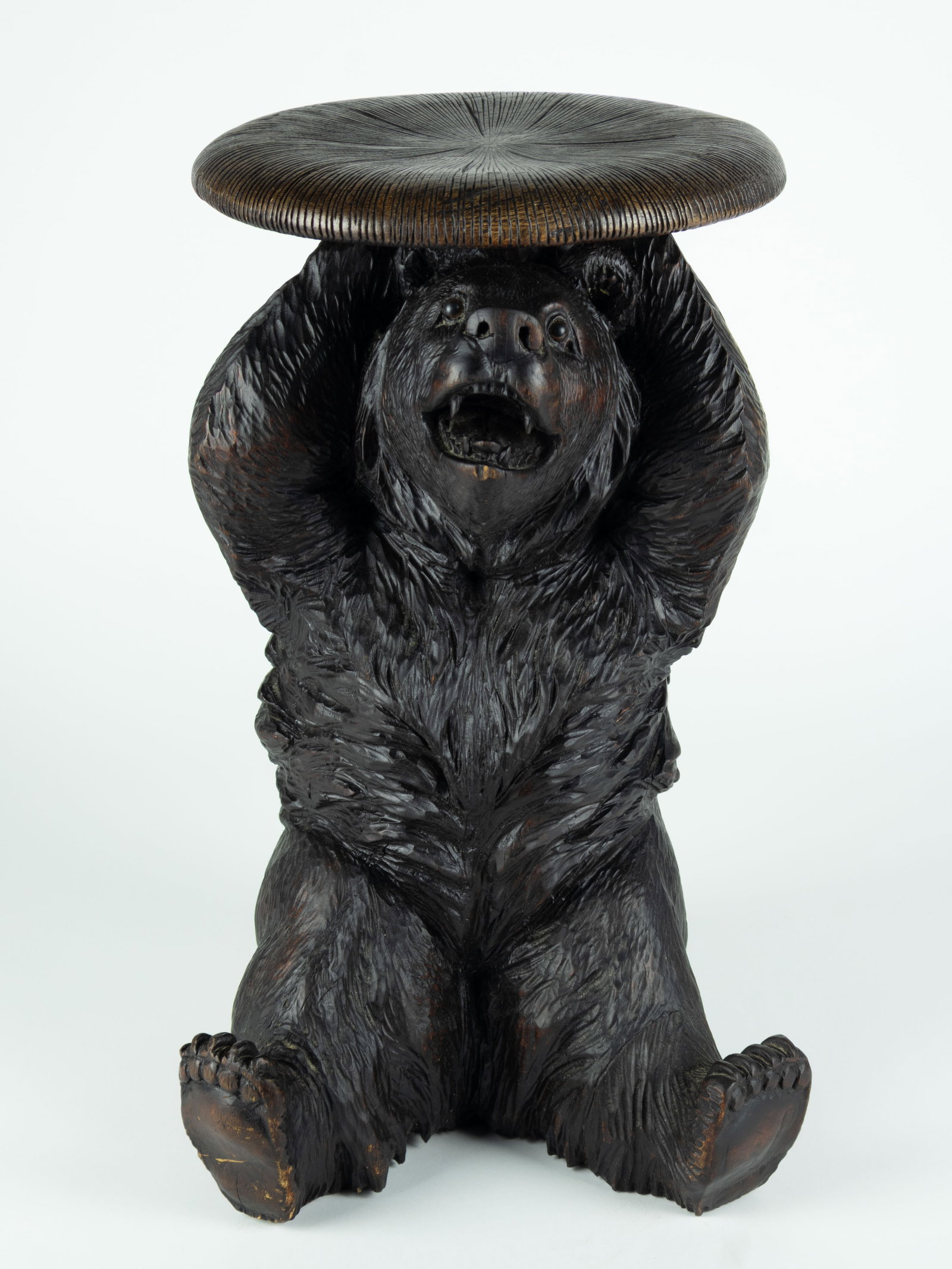 Attributed to Peter Trauffer, Swiss Carved Bear Piano Stool, c. 1890-1910: Attributed to Peter Trauffer Swiss Carved Bear Piano Stool, c. 1890-1910 linden wood with adjustable rotating carved seat 20 x 12 x 12 in. Provenance: Private Collection, Jackson, WY