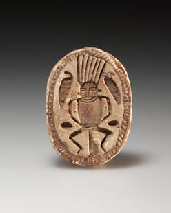 AN EGYPTIAN FAIENCE SCARAB BEAD WITH BES: "