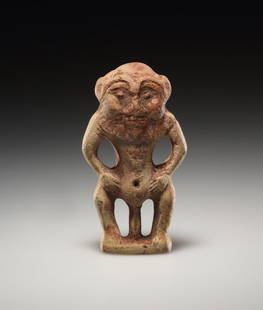 AN EGYPTIAN TERRACOTTA FIGURE OF BES: "