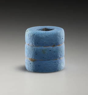 AN EGYPTIAN FAIENCE CYLINDER: "