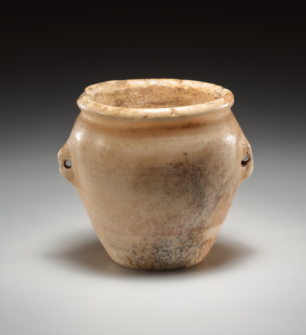 AN EGYPTIAN STONE VESSEL WITH LUG HANDLES (1 of 5)
