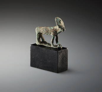 AN EGYPTIAN BRONZE APIS BULL: "