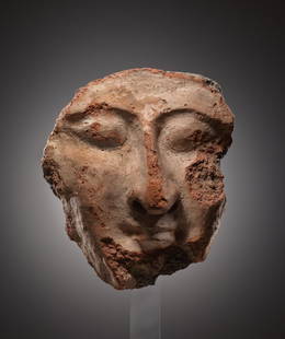 A PHOENICIAN OR LEVANTINE MASK FROM AN ANTHROPOID SARCOPHAGUS: "