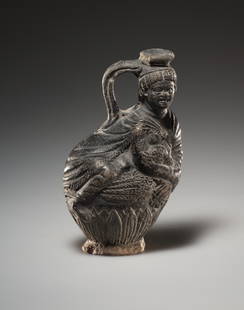AN ALEXANDRINIAN ANTHROPOMORPHE LEKYTHOS: "