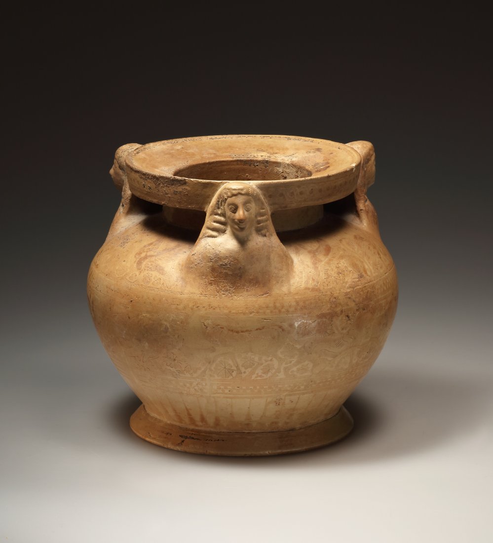 A CORINTHIAN POTTERY PYXIS WITH FEMALE PROTOMES (1 of 7)