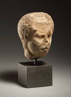 A HELLENISTIC MARBLE HEAD OF A YOUTH (ACTAEON?): "