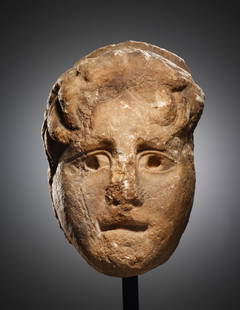 A ROMAN MARBLE HEAD OF A YOUTH IN RELIEF: "