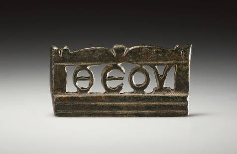 A ROMAN BRONZE TABLET WITH INSCRIPTION: "