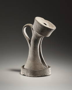A POSSIBLY ROMAN TERRACOTTA SPOUTED VESSEL INT THE FORM OF AN ANIMAL LEG: "
