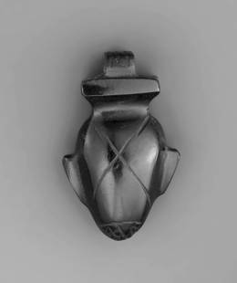 AN EGYPTIAN STEATITE HEART PENDANT: "