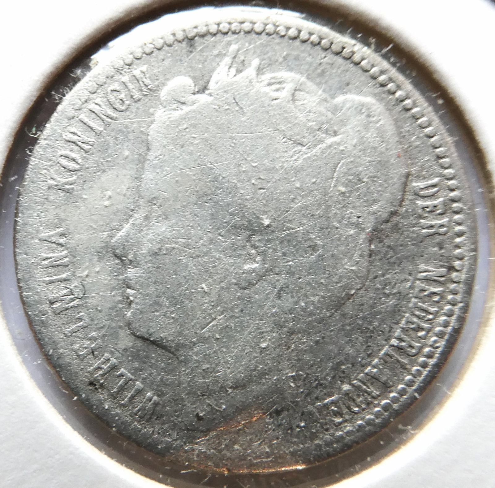 1900 Netherlands 1/10 Gulden Silver coin: CountryNetherlands East IndiesDenomination1/10 guldenYear1854-1901PeriodNetherlands East Indies (1826 - 1945)Coin typeCirculation coinsRulerWilhelmina / William IIICompositionSilver 0.720Edge typeReed