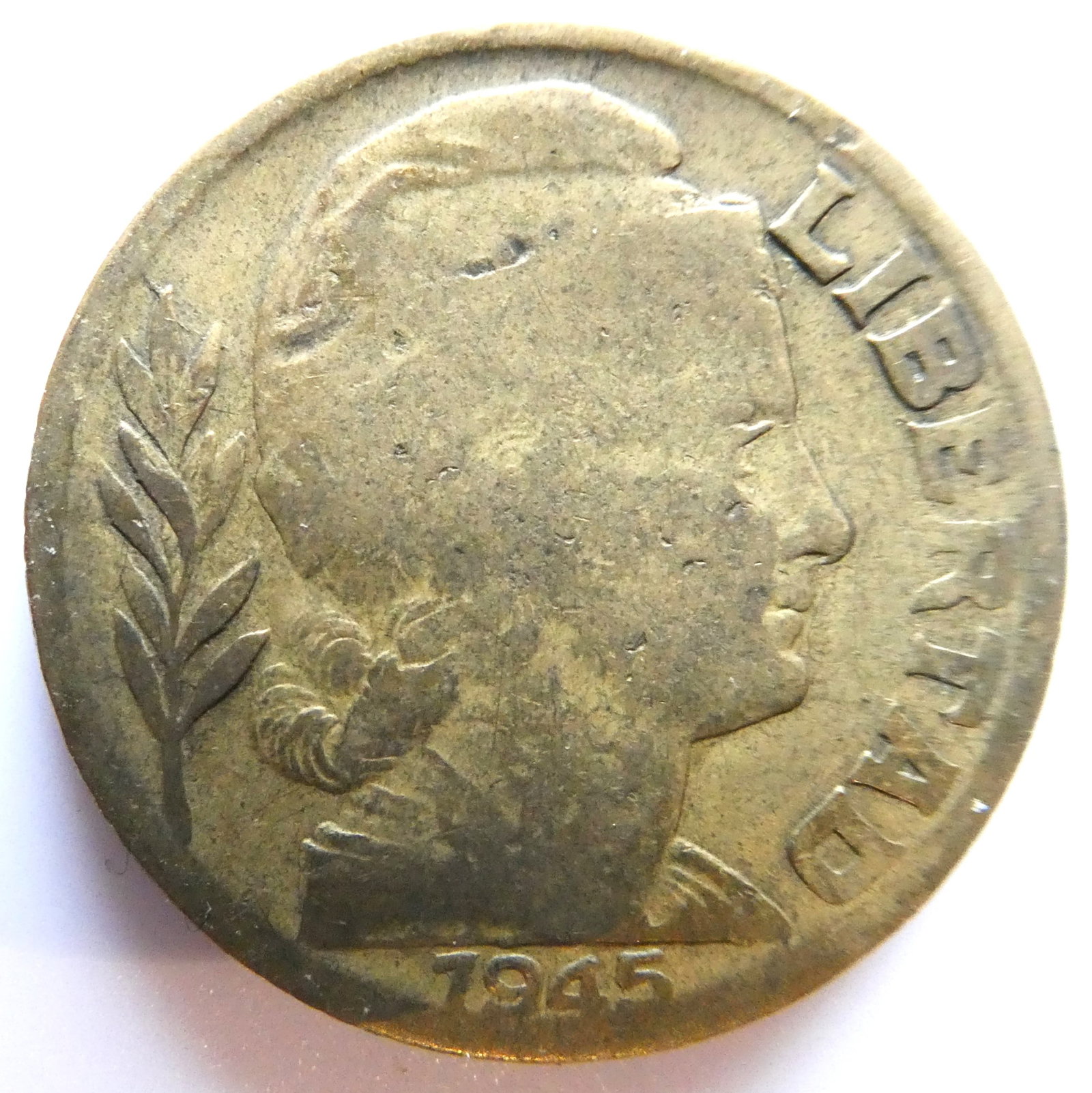 Argentina 20 centavos 1945 Capped Liberty Head: IssuerArgentina PeriodFederal Republic (1861-date)TypeStandard circulation coinYears1942-1950Value20 Centavos (0.20 ARM)CurrencyPeso moneda nacional (1881-1969)CompositionAluminium bronze (Cu 92 Al 8)