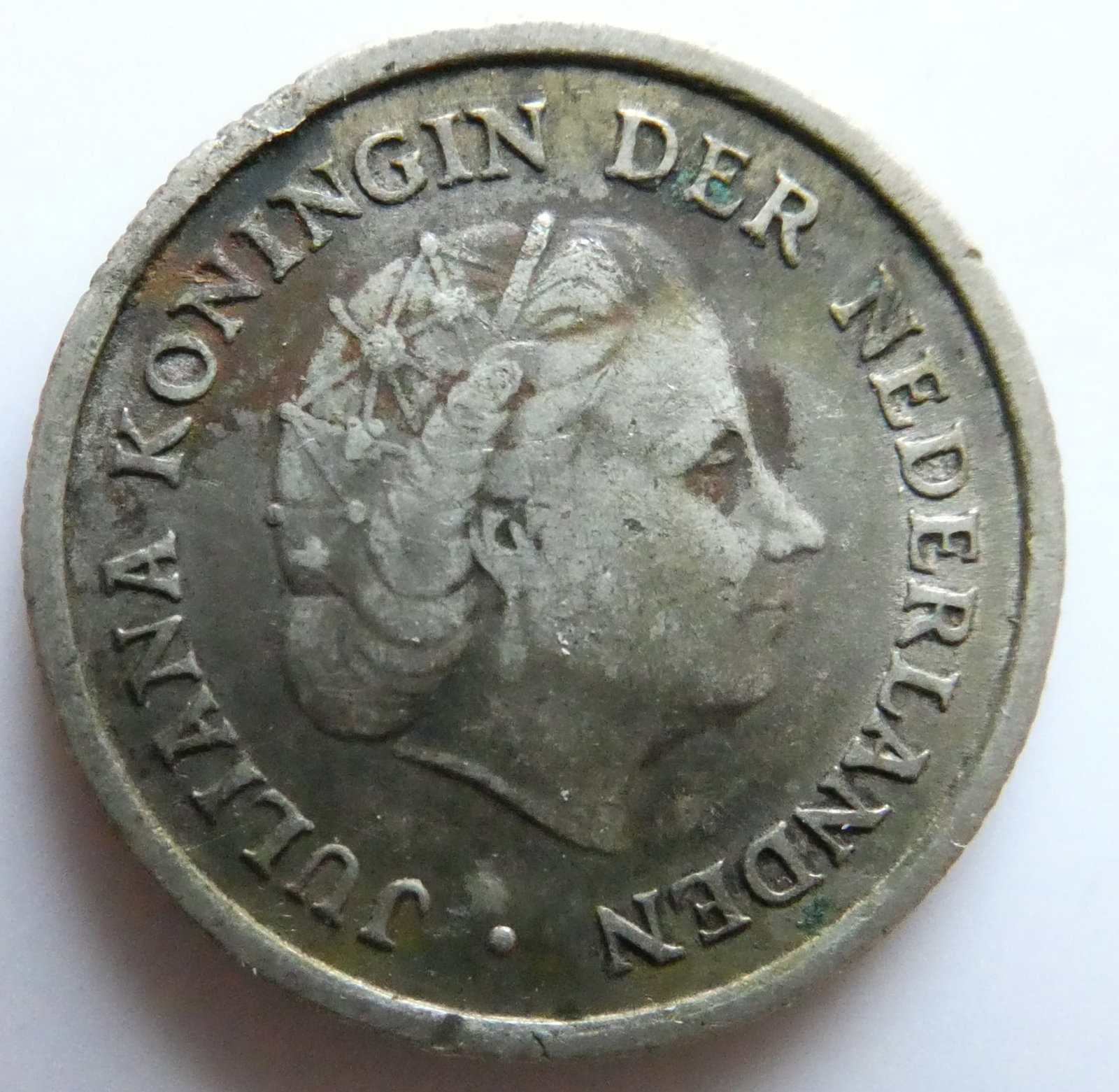 1962 Queen Juliana Netherlands Antilles 1/10 gulden Silver Coin: 1962 Queen Juliana Netherlands Antillean Silver Tenth GuilderCountryNetherlands AntillesDenomination1/10 guldenYear1954-1970PeriodQueen Juliana (1952 - 1980)Coin typeCirculation coinsRulerJulianaCompo