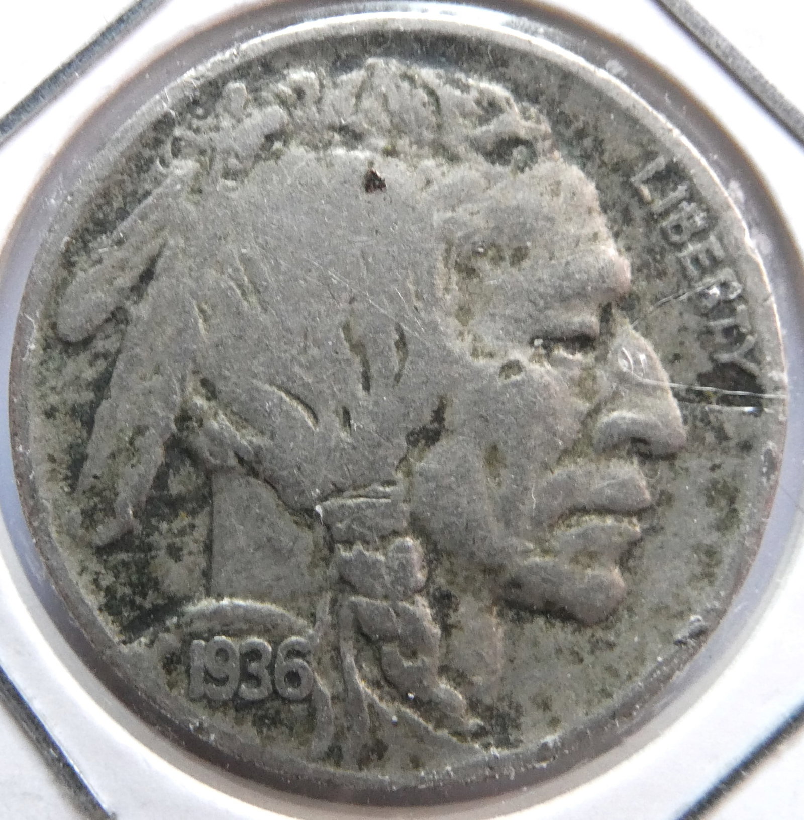 1936 Buffalo Nickel: There is no silver in The Buffalo nickels minted from 1913 to 1938. Those coins were a mixture of copper and nickel. Buffalo nickels do not contain silver content. The composition of a Buffalo nickel 