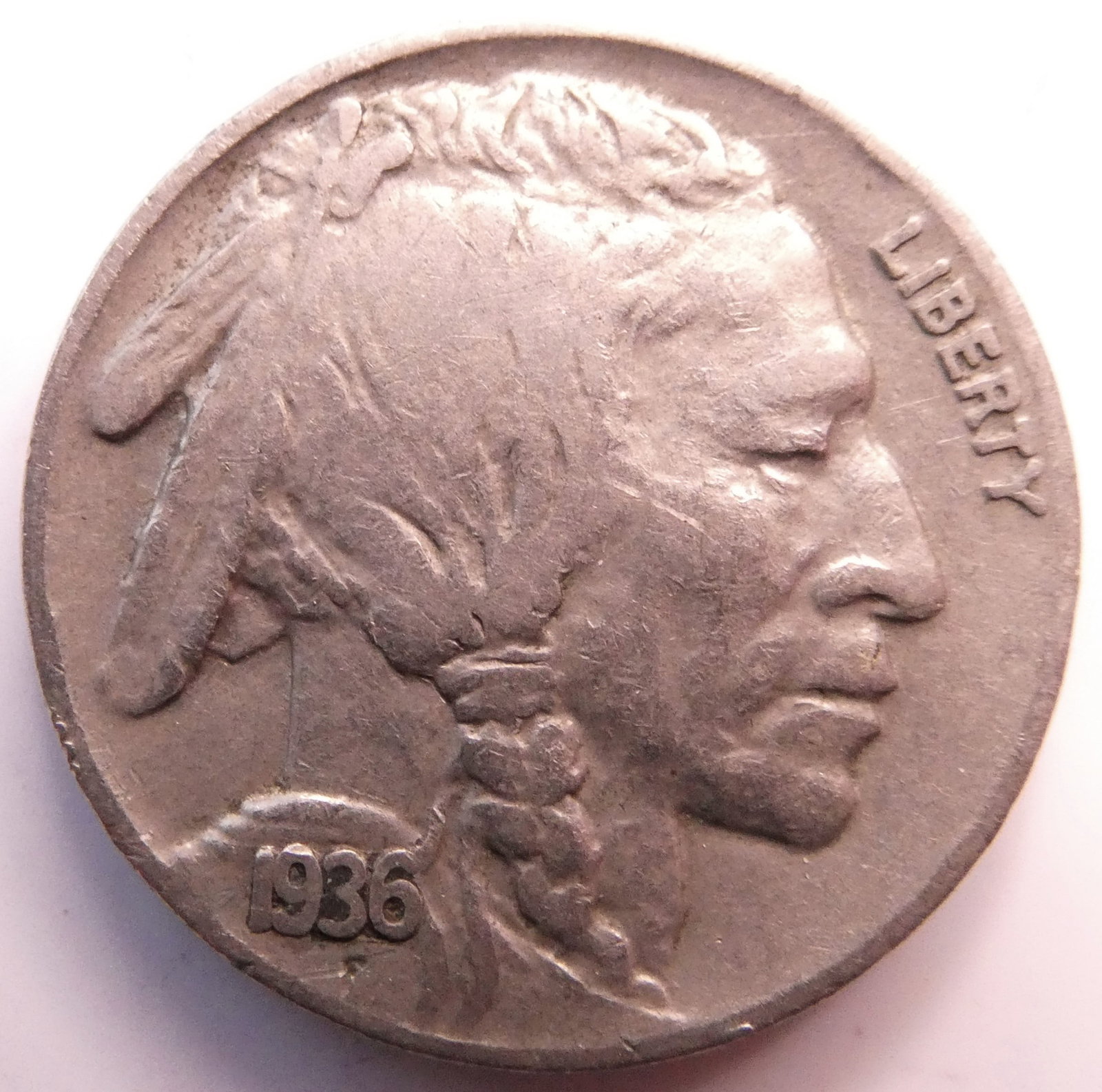 Buffalo Nickel 1936: There is no silver in The Buffalo nickels minted from 1913 to 1938. Those coins were a mixture of copper and nickel. Buffalo nickels do not contain silver content. The composition of a Buffalo nickel 