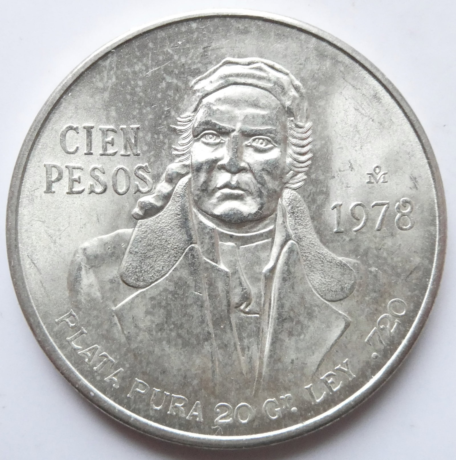 1978 Mexican Independence HERO Jose Maria Morelos Silver 100 Peso Coin (27,78g): IssuerMexico PeriodUnited Mexican States/Mexican Republic (1823-date)TypeStandard circulation coinYears1977-1979Value100 Pesos (100 MXP)CurrencyPeso (1823-1992)CompositionSilver (.720) (Copper .280)We