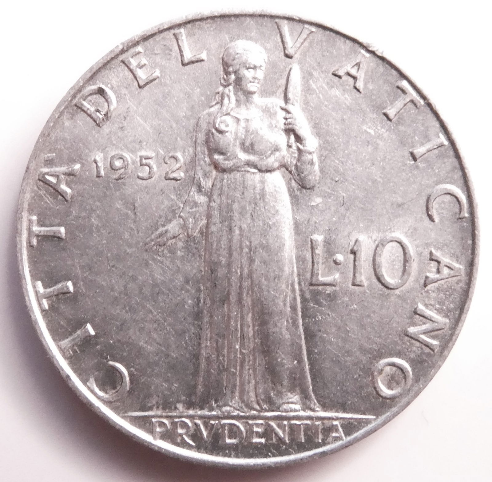 1952 Vatican Coin 10 Lira - Pope Piu XII: CountryVatican CityDenomination10 lireYear1951-1958PeriodPope Pius XII (1939 - 1958)Coin typeCirculation coinsRulerPius XIICompositionAluminiumEdge typeSmoothShapeRoundAlignmentCoin (180Â°)Weight (g