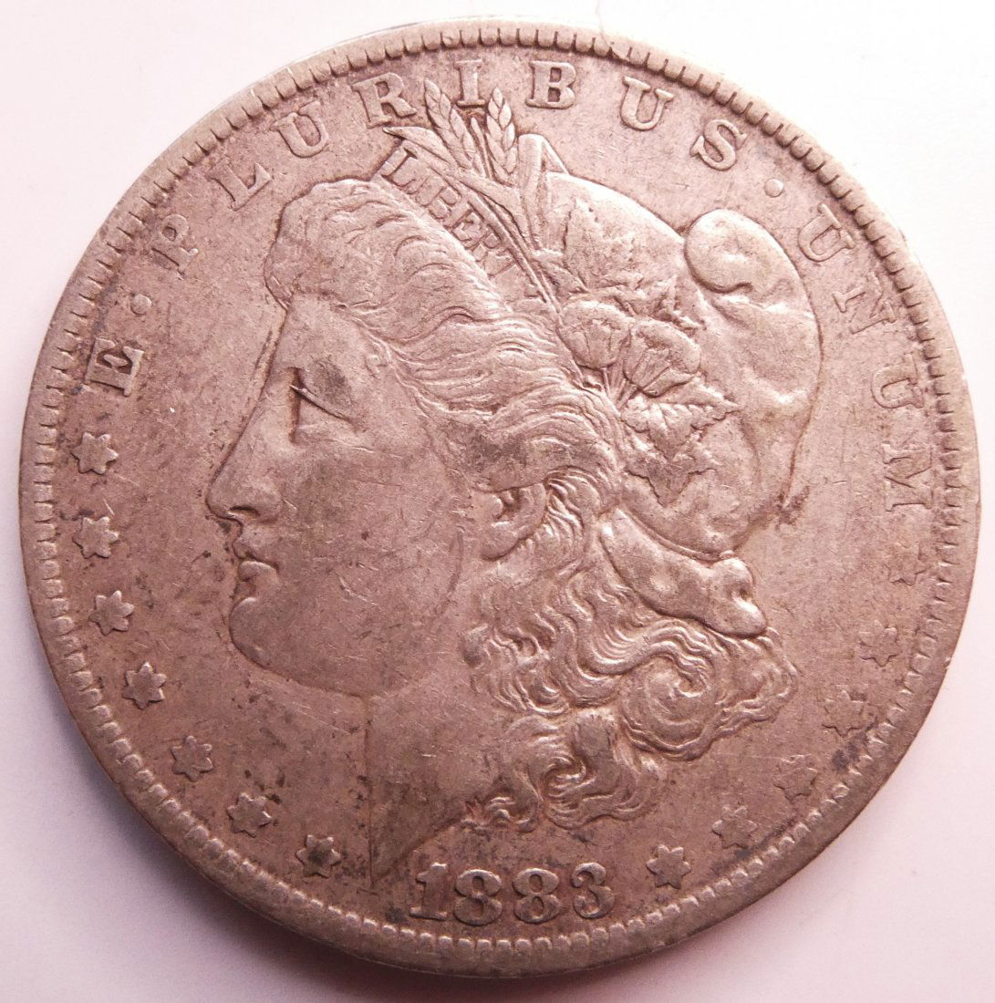 US Morgan one dollar 1883-O silver coin (1 of 2)