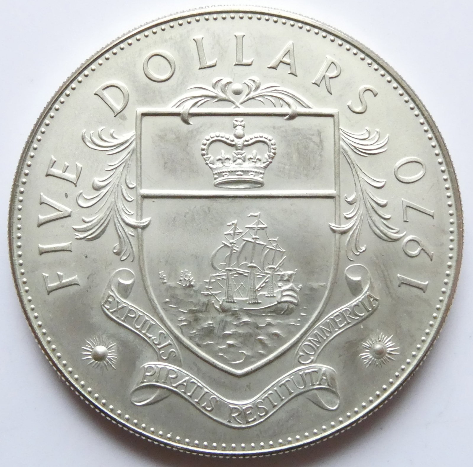 5 Dollars - Elizabeth II Silver Proof coin (42.12g): IssuerThe Bahamas QueenElizabeth II (1952-2022)TypeNon-circulating coinYear1971Value5 Dollars5 BSD = SEK 55CurrencyDollar (1966-date)CompositionSilver (.925) (Copper .075)Weight42.12 gDiameter45.01 mm