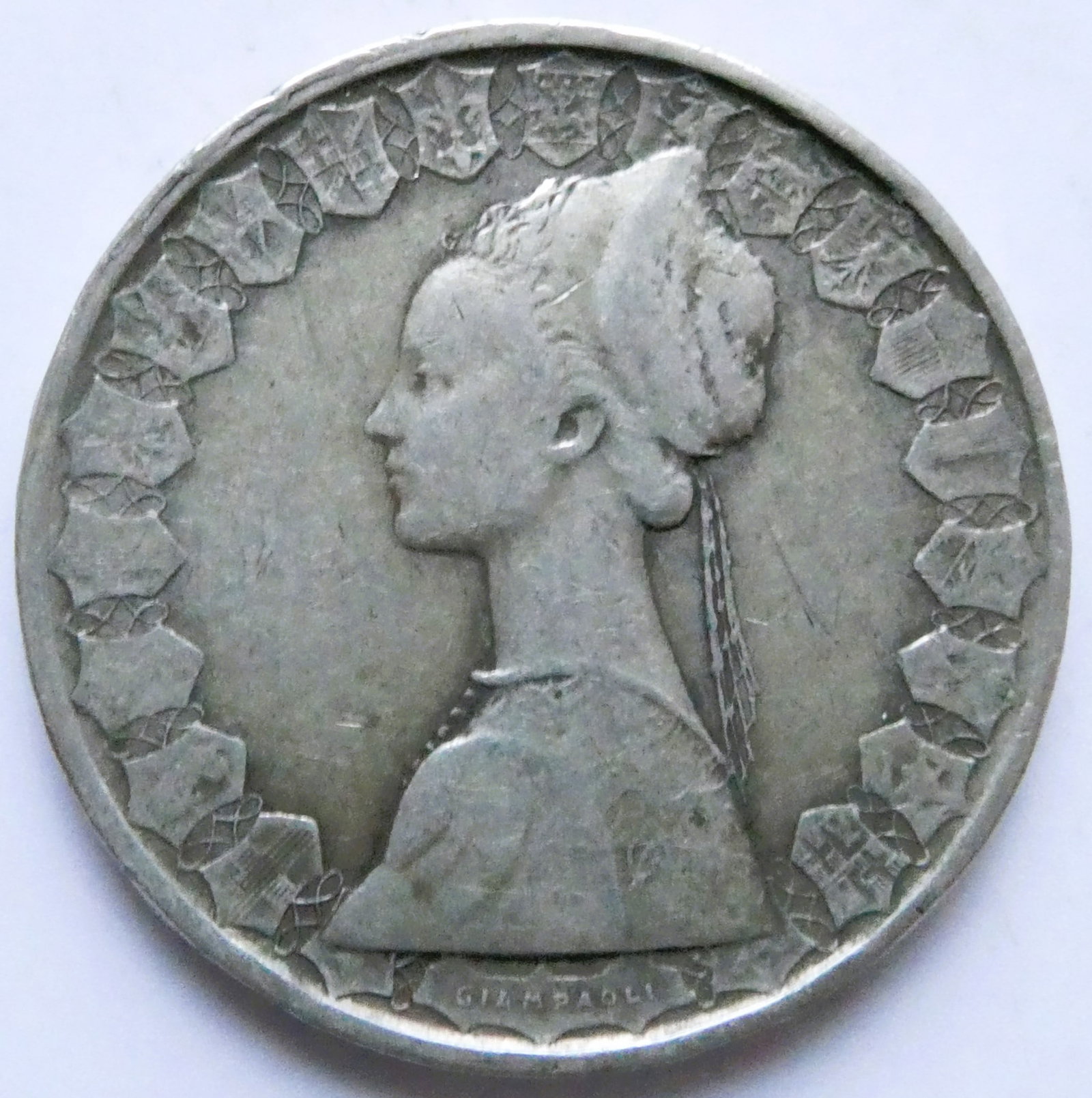 Italy 500 Lire Silver coin 1961 Christopher Columbus's ships, the Nina, Pinta and Santa Maria: IssuerItaly PeriodRepublic (1946-date)TypeStandard circulation coinYears1958-2001Value500 Lire (500 ITL)CurrencyLira (1861-2001)CompositionSilver (.835) (Copper .165)Weight11 gDiameter29.3 mmThickness
