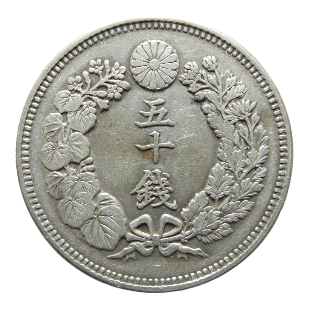 Japan 50 Sen - Meiji 1906-1912 Silver coin: Issuer Japan Emperor Meiji (1867-1912)Type Standard circulation coinYears 39-45 (1906-1912)Calendar Japanese - Meiji eraValue 50 Sen (0.50 JPY)Currency Yen (1871-date)Composition Silver (.800)Weight 1