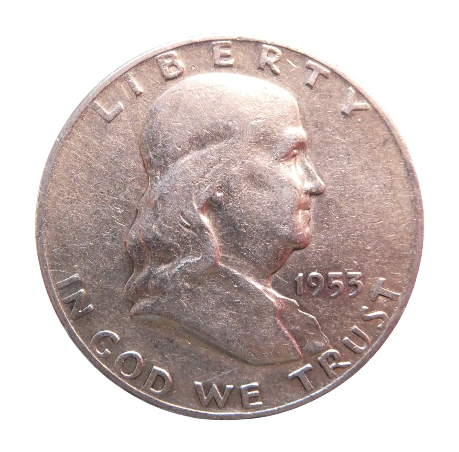 1953 Franklin Half Dollar, Denver Mint, Silver Coin: This United States half dollar coin from 1953 features the Franklin design, struck at the Denver Mint, as indicated by the small "D" mintmark above the Liberty Bell on the reverse. The obverse bears a