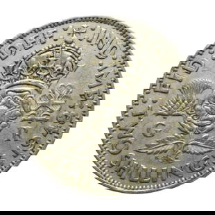 1948 UK Two Shillings, George VI, Floral Emblems, KM# 865: This British two shillings coin (also known as a florin) from 1948 features an intricate floral design symbolizing the unity of the United Kingdom. The crowned Tudor rose at the center is flanked by a