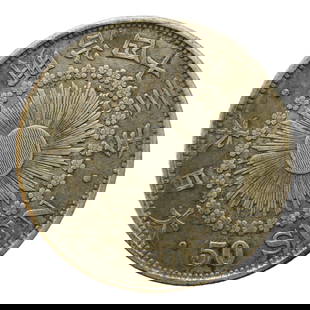 1906 Japan 50 Sen Rising Sun Silver Coin, Meiji 39: This 50 Sen silver coin was issued in 1906 during the 39th year of Emperor Meiji's reign, marking a significant change in Japan?s coinage design. That year, the reverse of the 50 Sen coin was updated