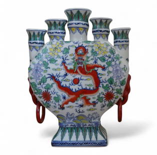 Chinese Famille Verte Dragon tulip Vase with Qianlong Mark, 20th Century: This polychrome enameled porcelain vase features a striking five-spout design with a flattened body and is decorated in vibrant famille verte palette. The central motif on both sides is a dynamic red